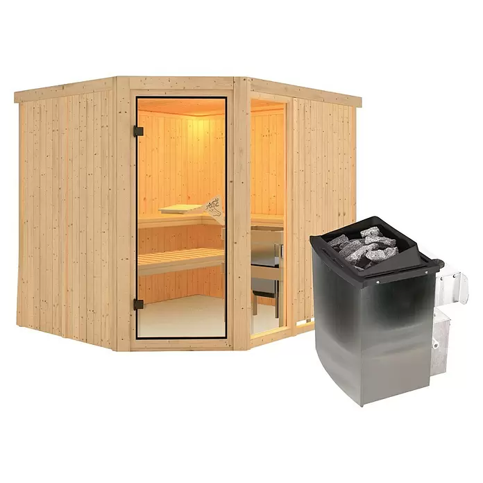 Karibu Elementsauna Mulilo - 9 kW Saunaofen mit integrierter Steuerung, L x B x H: 196 x 231 x 198 cm - Hölzerne Saunakabine mit Glastür und hellem Holzinterieur, daneben ein dunkelgrauer/silberner Saunaofen mit Steinen.