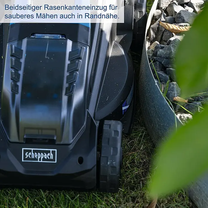 Scheppach IXES 20V Akku-Rasenmäher BC-MP320-X - 20 V, 1 Akku, 4 Ah, Schnittbreite: 32 cm - Rasenkantenschneider von Scheppach beim Rasenmähen in der Nähe einer Steinkante für saubere Ergebnisse.