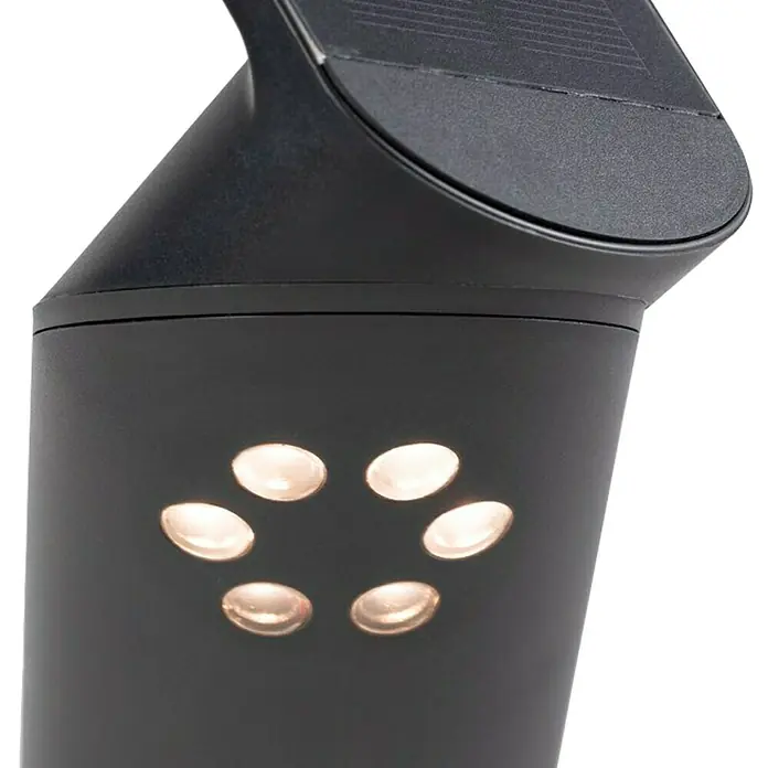 Paulmann Ilias Aplique solar para exterior - 1,2 W, L x An x Al: 17,5 x 7,3 x 26,1 mm, Antracita, IP44 - Primer plano de una luz solar negra con seis puntos de luz redondos que emiten un brillo cálido, perfecta para iluminar tu jardín.