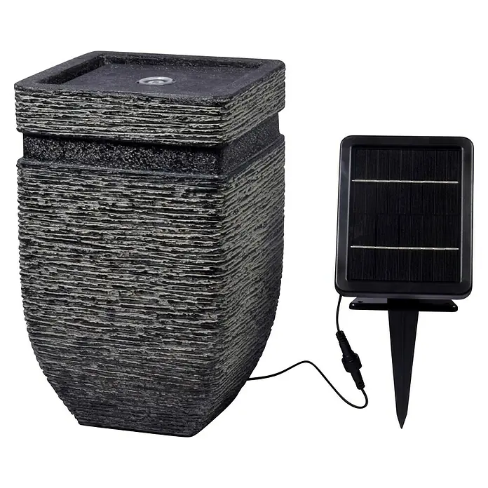 Dobar Gartenbrunnen Hera LED + Solar-Panel - 25 x 25 x 40 cm, Sonstiges - Dieses Bild zeigt einen Solarbrunnen mit einem grauen, strukturierten Design und einem separaten Solarpanel zur Stromversorgung.