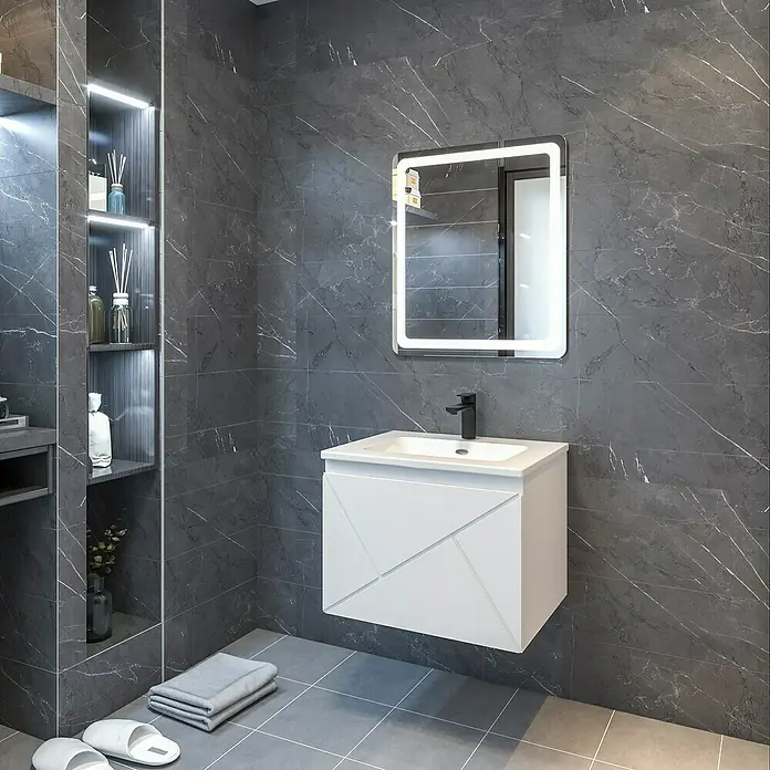 Disbain Conjunto de mueble de baño Lira - Ancho: 60 cm, Blanco, 3 pzs. - Un baño moderno con un elegante tocador blanco y un espejo iluminado sobre una pared de mármol gris. Diseño elegante.