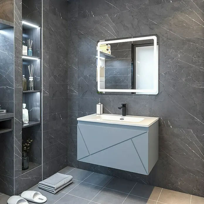 Disbain Conjunto de mueble de baño Lira - Ancho: 80 cm, Azul soho, 3 pzs. - Interior de baño con un moderno mueble de lavabo azul claro y espejo iluminado sobre una pared de mármol gris.