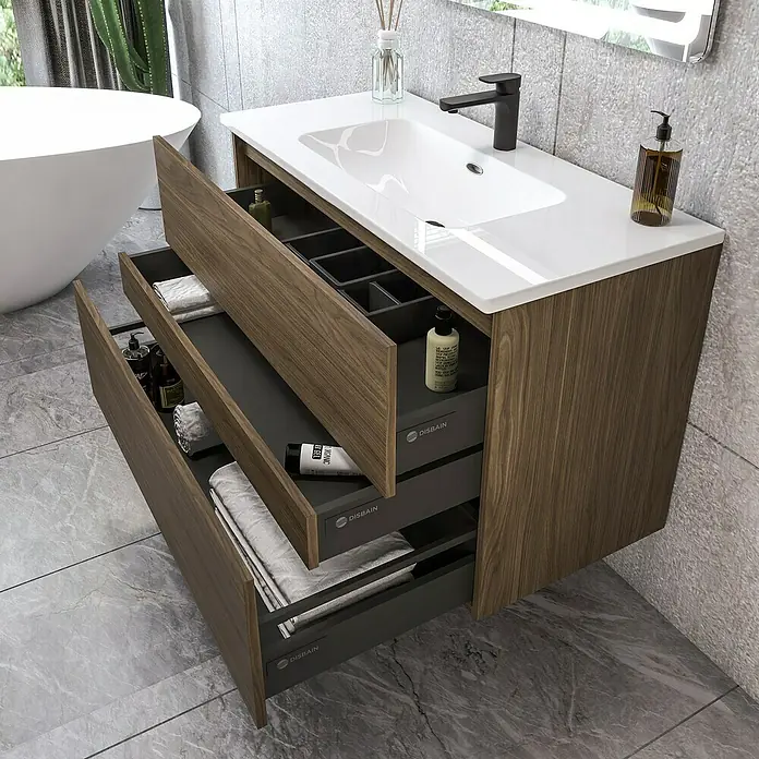 Disbain Conjunto de mueble de baño Kuntur - Ancho: 100 cm, Nogal italiano, Mate - Un tocador de baño moderno con lavabo y cajones abiertos, que ofrece almacenamiento y organización. El diseño de madera aporta calidez al espacio.