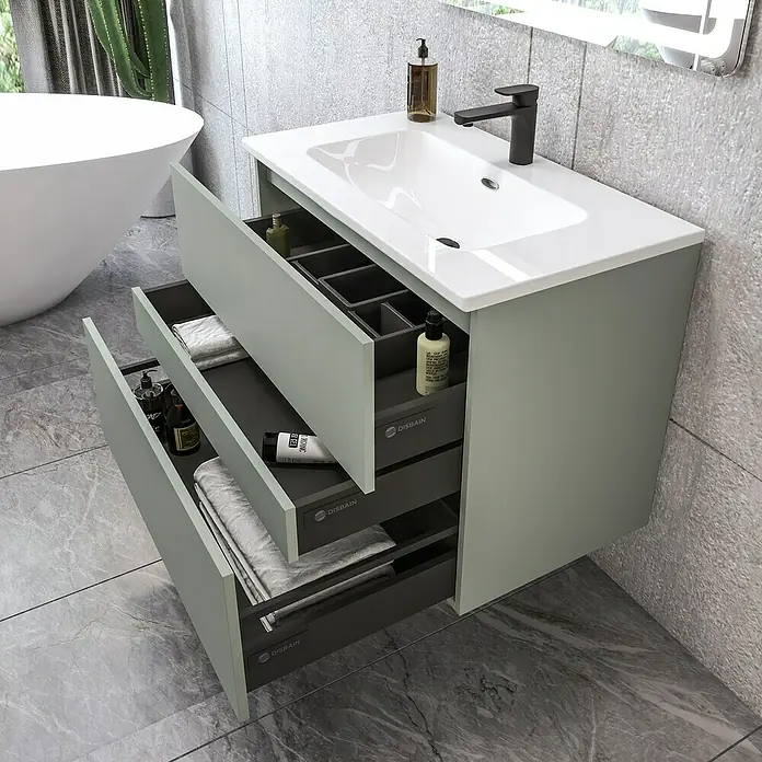 Disbain Conjunto de mueble de baño Kuntur - Ancho: 80 cm, Verde té, Mate - El moderno lavabo de baño con cajones en verde grisáceo ofrece un espacio de almacenamiento elegante para accesorios y toallas.