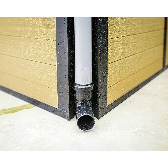 Palram – Canopia Caseta de jardín Copenhaguen - Medidas ext. (An x Pr): 351 x 287 cm, Plástico, Negro - Primer plano de una canaleta de lluvia fijada a una fachada, con gotas de agua en la superficie.