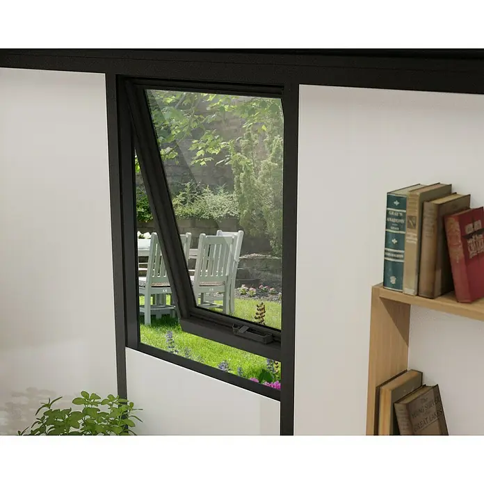 Palram – Canopia Caseta de jardín Copenhaguen - Medidas ext. (An x Pr): 351 x 287 cm, Plástico, Negro - Una ventana abatible con marco negro está abierta y ofrece una vista a un exuberante jardín y patio. En el interior, hay una estantería visible.