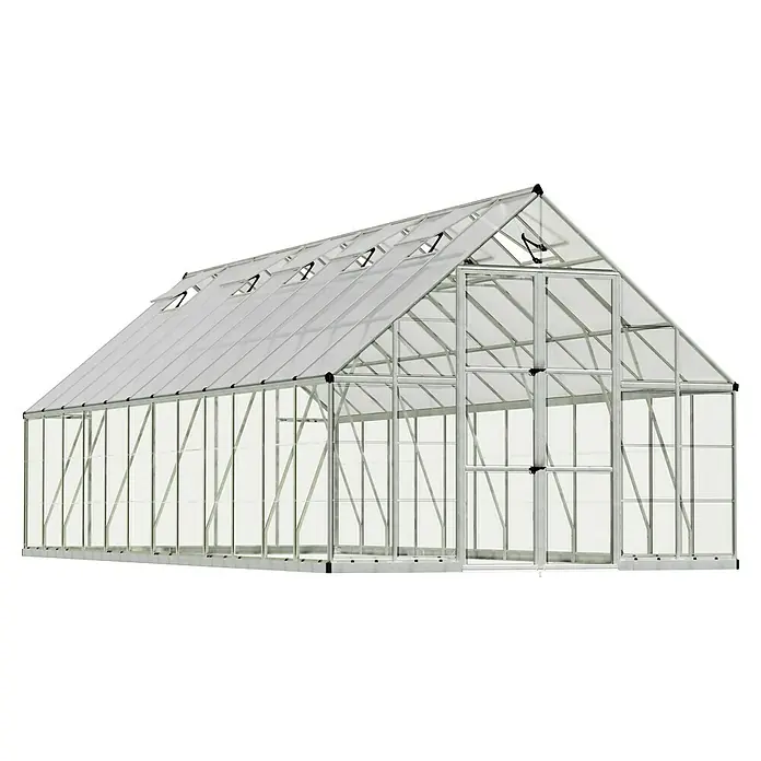Palram – Canopia Invernadero Balance - Medidas ext. (An x Pr): 304 x 724 cm, 0,7 mm, Plateado - Un gran invernadero plateado con paredes transparentes y múltiples ventanas en el techo, ideal para jardineros.