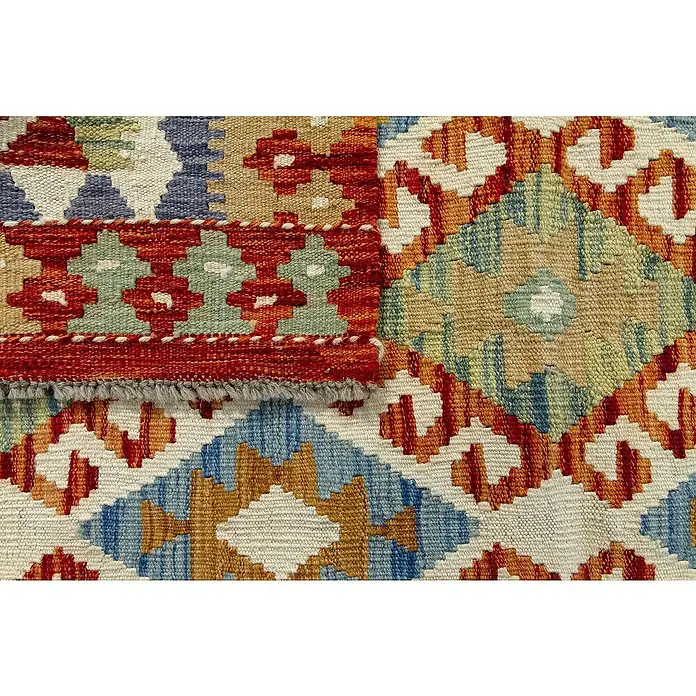 Alfombra de pelo corto Kilim Herat - Multicolor, 150 x 100 cm, 100% lana - Imagen de una alfombra con patrones geométricos en naranja, azul, verde y blanco. La alfombra muestra técnicas de tejido tradicionales y colores.