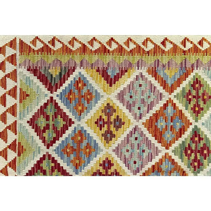 Alfombra de pelo corto Kilim Herat - Multicolor, 180 x 120 cm, 100% lana - Primer plano de una alfombra tejida que muestra coloridos patrones de diamantes, que ilustran la artesanía y el diseño tradicionales.