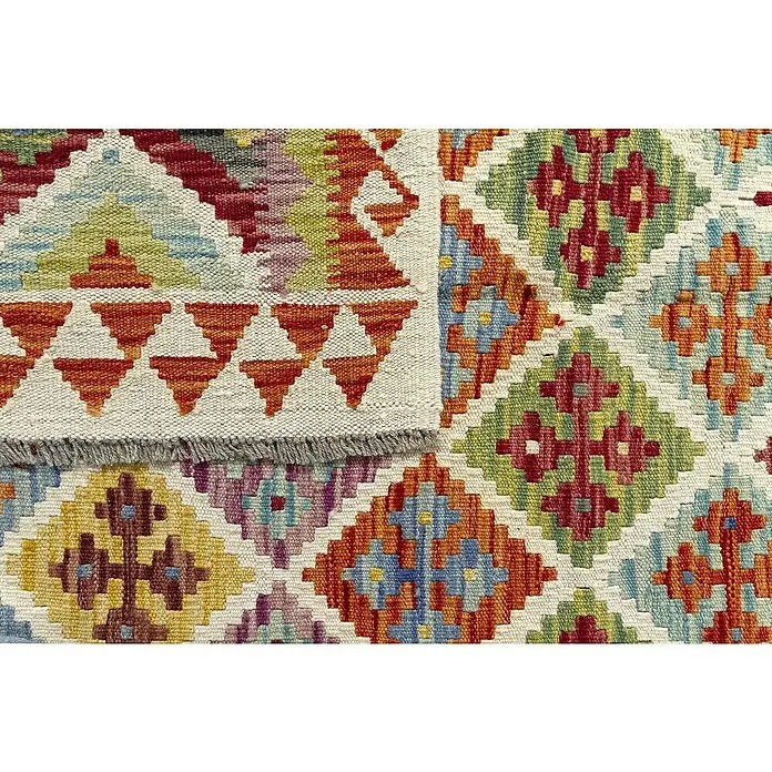 Alfombra de pelo corto Kilim Herat - Multicolor, 180 x 120 cm, 100% lana - Primer plano de una alfombra kilim tejida a mano con vibrantes diseños geométricos.
