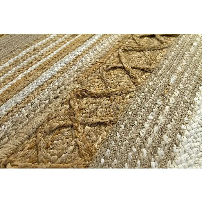 Alfombra de yute París - Natural, 110 x 60 cm, 100% yute - Primer plano de una alfombra tejida con fibras marrones y blancas y trenzas decorativas. El material natural y la textura están en foco.