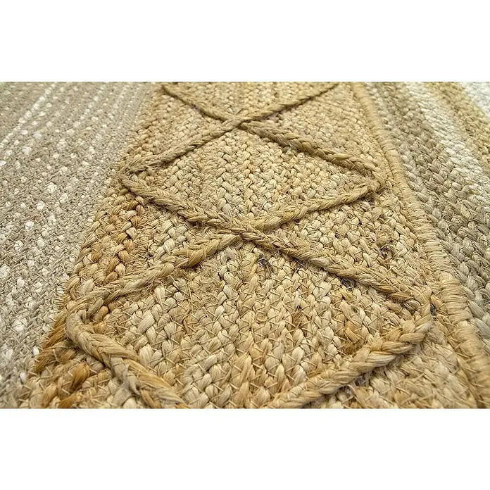 Alfombra de yute París - Natural, 230 x 160 cm, 100% yute - Primer plano de una alfombra de yute tejida con detalles trenzados, destacando la textura y el material natural.