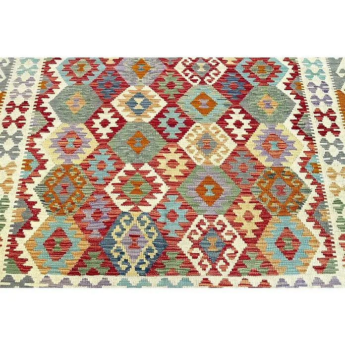 Alfombra de pelo corto Kilim Herat - Multicolor, 240 x 170 cm, 100% lana - Una alfombra que muestra un patrón de rombos repetido en una variedad de colores, mostrando un diseño tradicional y decorativo.