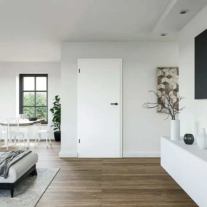Invado Zimmertür ND1 ohne Schlüssellochbohrung - 735 x 1.985 mm, DIN Anschlag: Links, Verkehrsweiß matt, Röhrenspan - Weiße Innentür mit schlichtem, modernem Design und schwarzen Türgriffen, die sich elegant in den Wohnraum einfügt.