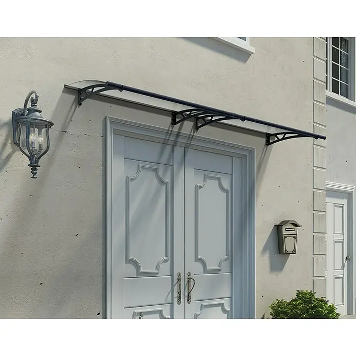 Palram – Canopia Marquesina para puerta Altair - 302 x 91 x 17,5 cm, Antracita - Un elegante toldo de puerta con panel transparente y estructura negra protege la entrada del viento y las inclemencias del tiempo.