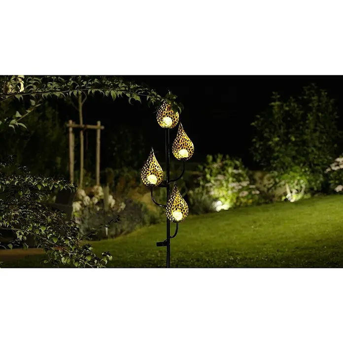 BAUHAUS Solar-Erdspieß Flame - 0,06 W, L x B x H: 38 x 38 x 151 cm, Schwarz/Gold, IP44 - Dekorative Gartenleuchte mit filigranem Muster, die eine warme, einladende Atmosphäre im Garten schafft.
