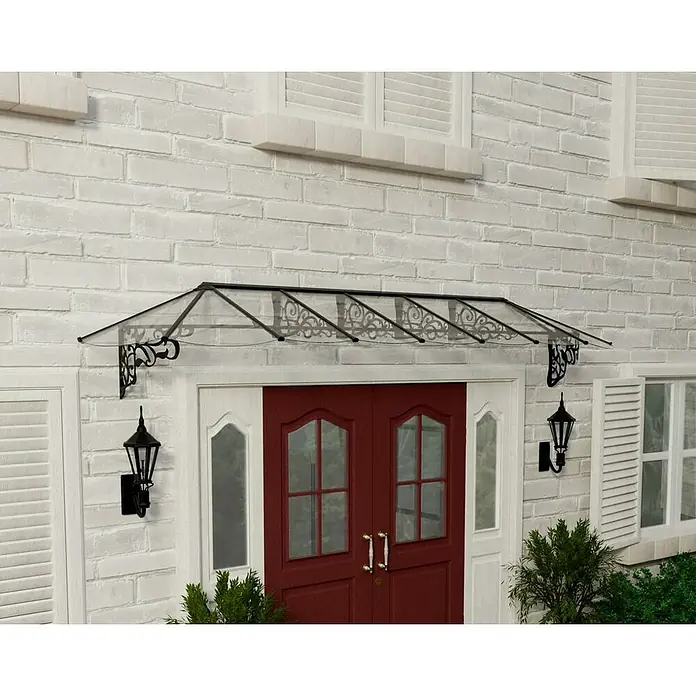 Palram – Canopia Marquesina para puerta Lily - 421 x 88 x 70 cm, Antracita - La imagen muestra un dosel de puerta con un elegante marco negro curvo sobre una puerta roja, detallado con diseños ornamentales.