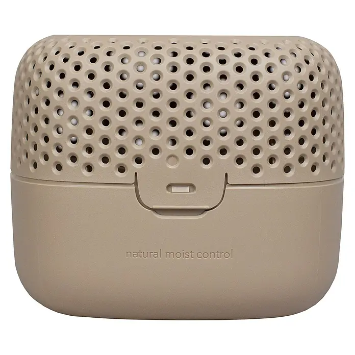 Absodry Duo Family Luftentfeuchter Series 3 - Beige - Ein beiger "Natural Moisture Control" Luftentfeuchter mit perforierter Oberseite zur Feuchtigkeitsregulierung in Räumen.