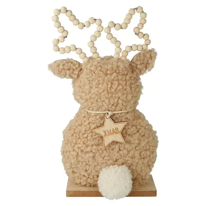 Dekofigur Hirsch - L x B x H: 13 x 5 x 24,5 cm, Braun/Grau, Holz, 1 Stk. - Beige flauschige Rentier-Dekoration mit Perlen-Geweih, hölzernem XMAS-Schild und flauschigem Schwanz auf Holzsockel.
