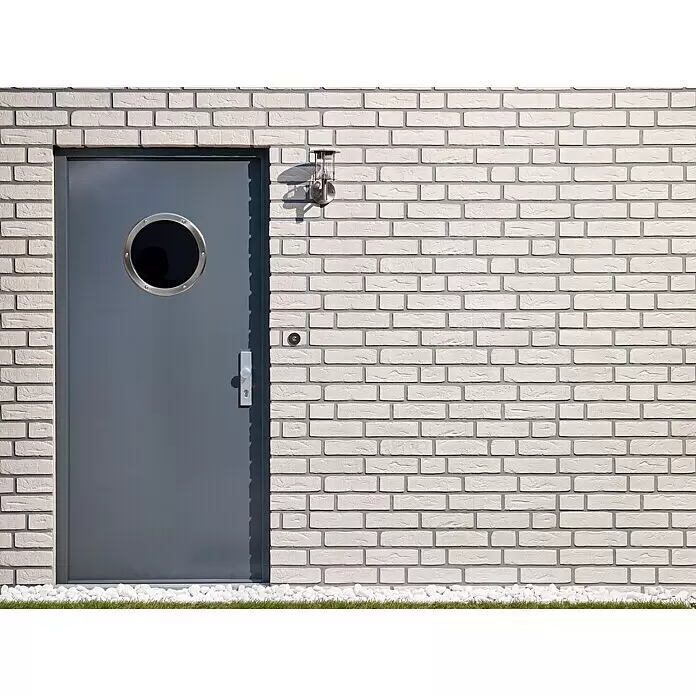 Tesa Montageband - Geeignet für: Mauerwerk, Belastbarkeit pro m: 10 kg, 1,5 m x 19 mm - Eine moderne graue Tür mit rundem Bullaugenfenster in einer weißen Ziegelwand.