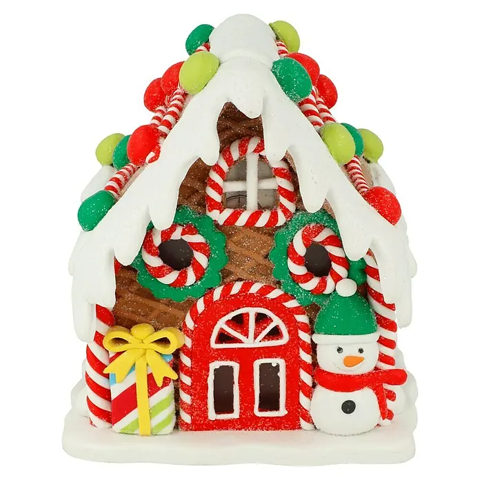 LED-Weihnachtsdekoleuchte Lebkuchenhaus - 12 x 14 x 12 cm, Mehrfarbig, Batteriebetrieben, LED - Lebkuchenhaus mit Zuckergussdach, Süßigkeiten und einem Schneemann neben der Tür. Perfekte festliche Dekoration für Weihnachten.