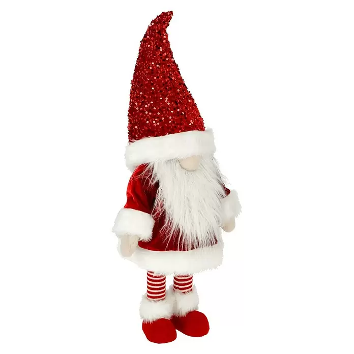 Dekofigur Weihnachtswichtel schaukelnd - L x B x H: 33 x 33 x 83 cm, Polyester - Festliche Weihnachtsgnom-Dekoration mit rotem Paillettenhut, weißem Pelzbesatz, rotem Samtkörper und gestreiften Beinen mit roten Schuhen.