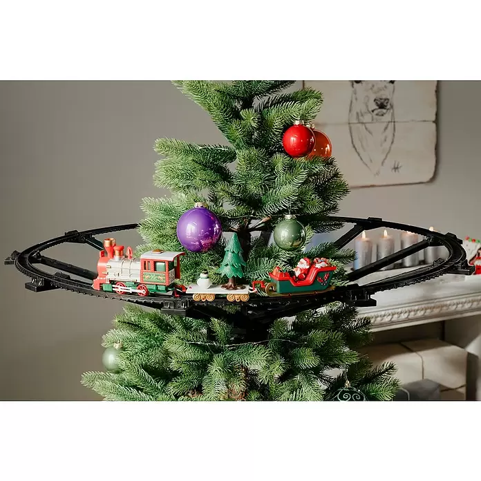 Christbaumschmuck Weihnachtszug - Rot, Schwarz, Kunststoff - Ein Weihnachtszug-Set mit rotem und grünem Zug, Weihnachtsmann-Schlitten, Schneemann und Baum auf schwarzer Schiene um einen Christbaum.