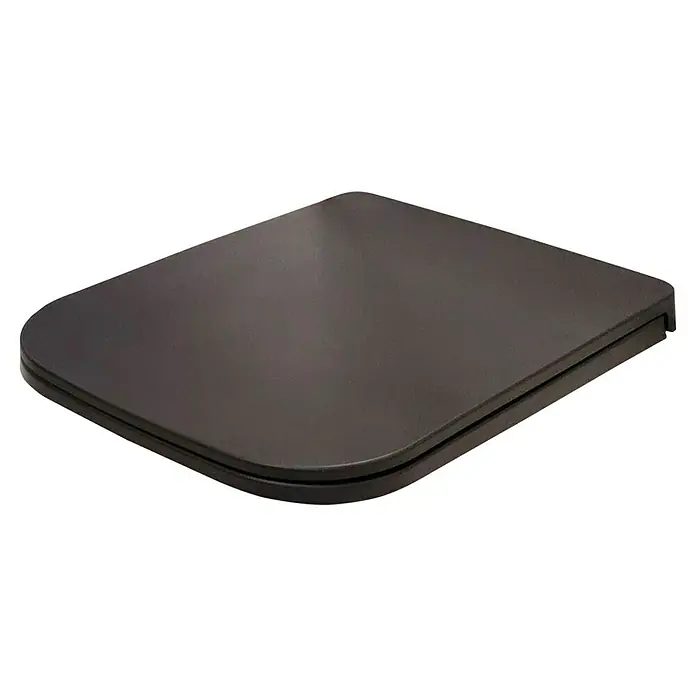 RAK Ceramics Metropolitan WC-Sitz - Duroplast, Schwarz, Mit Absenkautomatik - Nahaufnahme eines quadratischen, bronzefarbenen Podiums, das sich ideal zur Präsentation von Produkten oder als stilvolle Ablagefläche eignet.