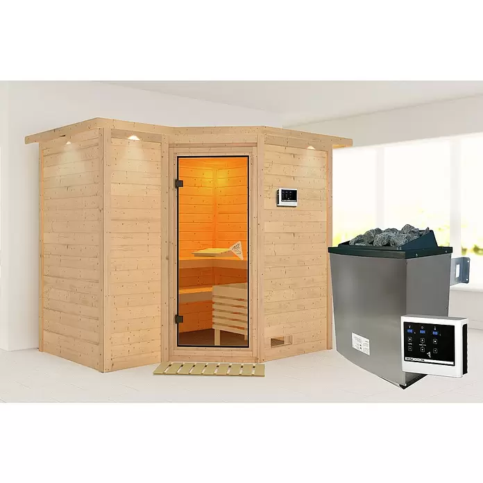 Karibu Massivholzsauna Sahib 2 - Mit 9 kW Ofen mit externer Steuerung, Mit Dachkranz und Beleuchtung, L x B x H: 264 x 198 x 200 cm - Helle Holz-Ecksauna mit Glastür, Bänken und Wandsteuerung. Silberner Saunaofen mit Steinen und Bedieneinheit.