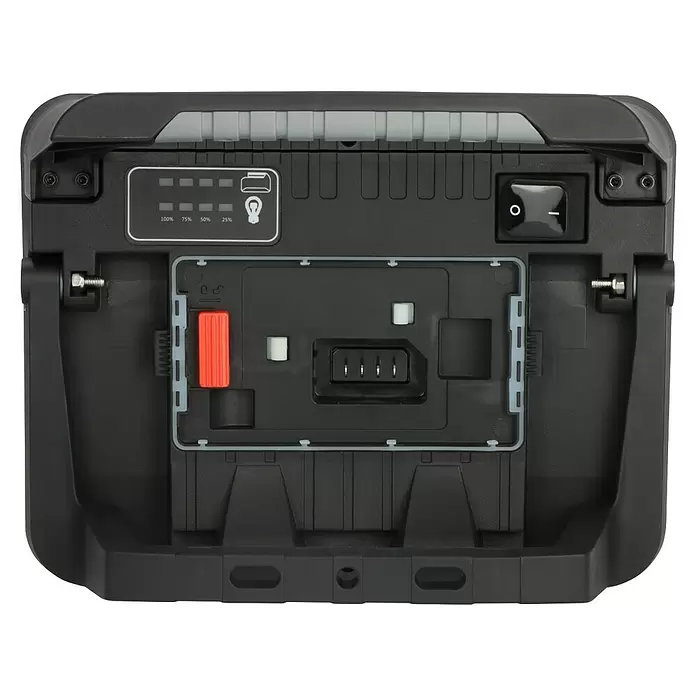Brennenstuhl LED-Akkustrahler Professional Multi Battery - 3.150 lm, 6.500 K, 16,9 x 28,5 x 22,7 cm, IP65 - Rückseite eines dunkelgrauen Arbeitsstrahlers mit Batterieanzeige, Schalter, rotem Hebel und Stromanschluss in einem Fach.