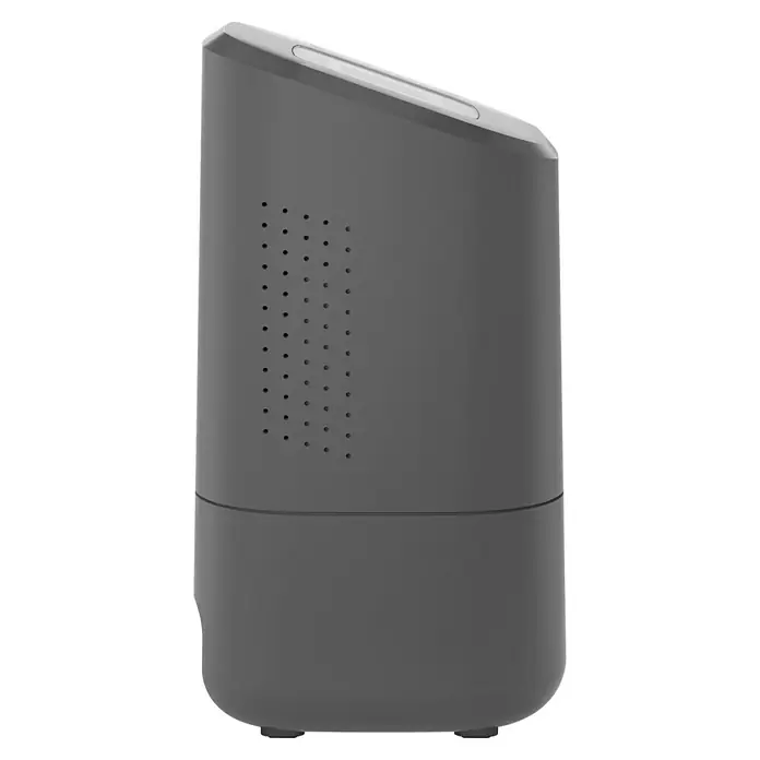 Homematic IP Steuerzentrale Home Control Unit HmIP-HCU1 - Anthrazit, L x B x H: 9,6 x 9,6 x 17,3 cm - Nahaufnahme eines grauen Geräts mit geneigter Oberseite und Lautsprecherlöchern.