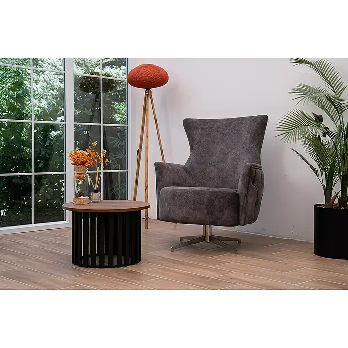 Tischbein CITYLINE Braga - Durchmesser: 44 cm, Höhe: 35 cm, Schwarz - Grauer Sessel mit hoher Rückenlehne und ein runder Beistelltisch mit einer Blumenvase in einem stilvollen Wohnzimmer.