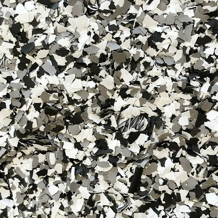 Fleur Elemento decorativo Flakes Terrazzo - Brown marble, Otros - Primer plano de copos decorativos para pisos epoxi en tonos de negro, gris y blanco para diseños elegantes.