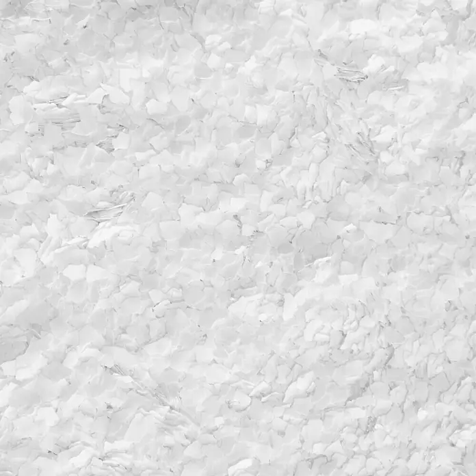 Fleur Elemento decorativo Flakes Terrazzo - Moonstone, Otros - Primer plano de hojuelas epoxi blancas, creando una superficie brillante y sin costuras para pisos y aplicaciones decorativas.