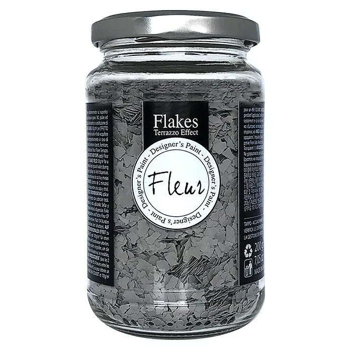 Fleur Elemento decorativo Flakes Terrazzo - Taupé Quartz, Otros - Primer plano de un bote de Fleur Designer's Paint con escamas efecto Terrazzo, para diseños de pared creativos y modernos.