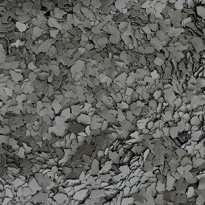 Fleur Elemento decorativo Flakes Terrazzo - Taupé Quartz, Otros - Esta imagen muestra un primer plano de escamas de recubrimiento de piso grises, que brindan una superficie duradera y atractiva para garajes o pisos industriales.