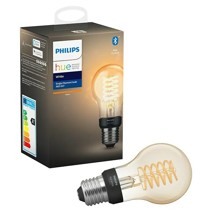 Philips Hue Bombilla LED inteligente Filamento blanco - E27, Intensidad regulable, Blanco cálido, 550 lm, 7 W, Denominación de la lámpara: A60 - La imagen muestra una bombilla Philips Hue White Filament con su embalaje, prometiendo una iluminación cálida y atmosférica.