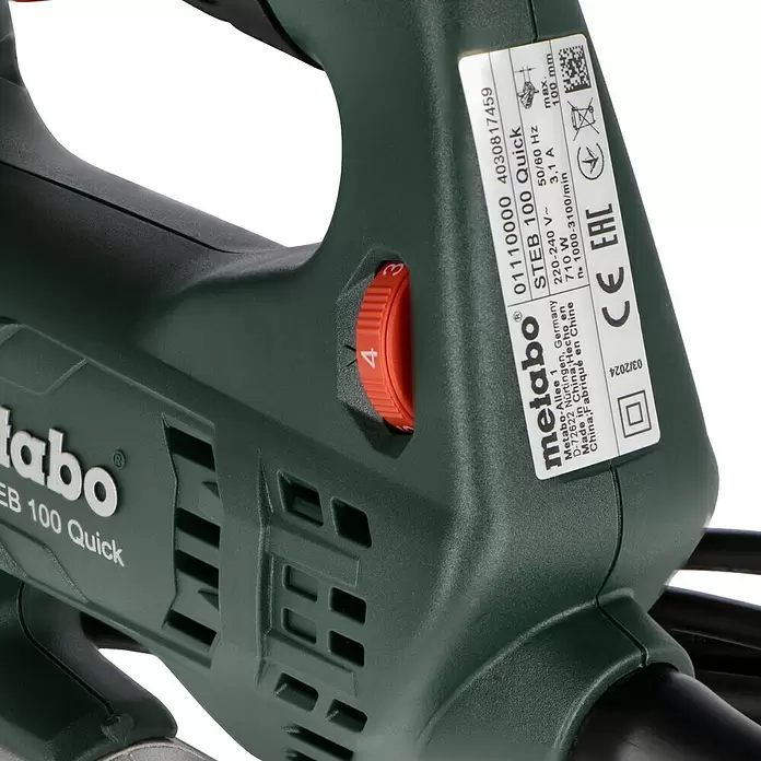 Metabo Caladora eléctrica STEB 100 Quick - 1.000 /min - 3.100 /min, Profundidad de corte máx. en madera: 100 mm, Número de niveles de elevación del péndulo: 4 ud. - Sierra de calar Metabo STEB 100 Quick verde oscuro con dial de velocidad rojo.