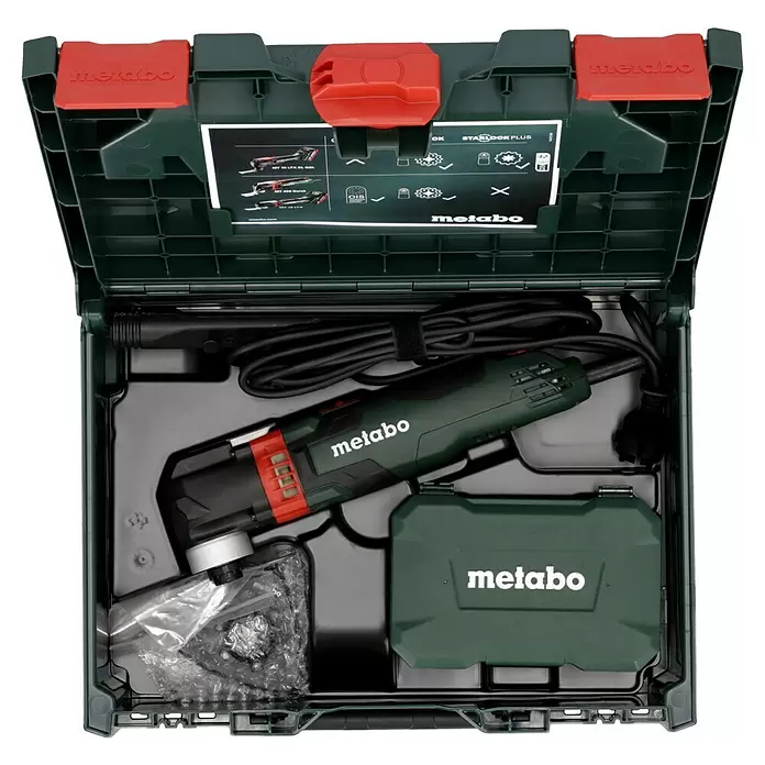 Metabo Herramienta multifunción eléctrica MT 400 Quick - 400 W, Sistema STARLOCK - Maleta rígida Metabo verde oscuro abierta con una multiherramienta verde con detalles rojos, cable y caja de accesorios.