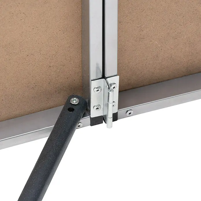 Tapeziertisch - 297 x 59,5 x 75 cm, MDF laminiert - Detailansicht eines klappbaren Tischbeins mit Scharnierbefestigung an einem Tisch mit Metallrahmen.