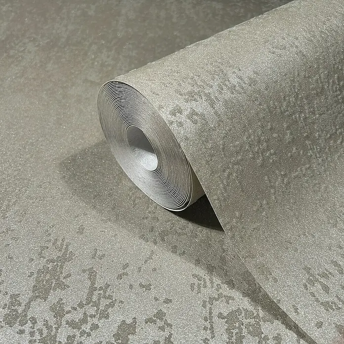Marburg Eclectic Vliestapete Glasperlenstruktur - Dunkelbeige, Metalloptik, 10,05 x 0,7 m - Nahaufnahme einer Rolle silberner Vinyltapete mit subtilem Texturmuster, ideal für moderne Innenräume, die einen Hauch von Eleganz suchen.