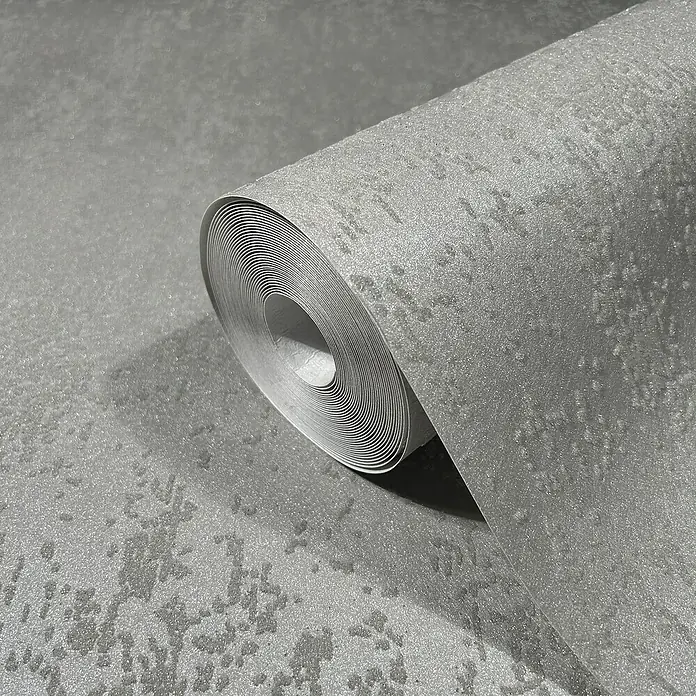 Marburg Eclectic Vliestapete Glasperlenstruktur - Grau, Metalloptik, 10,05 x 0,7 m - Nahaufnahme einer Rolle grauer Vinyltapete mit subtilem Muster, ideal für moderne Innenräume und zur Wandgestaltung.
