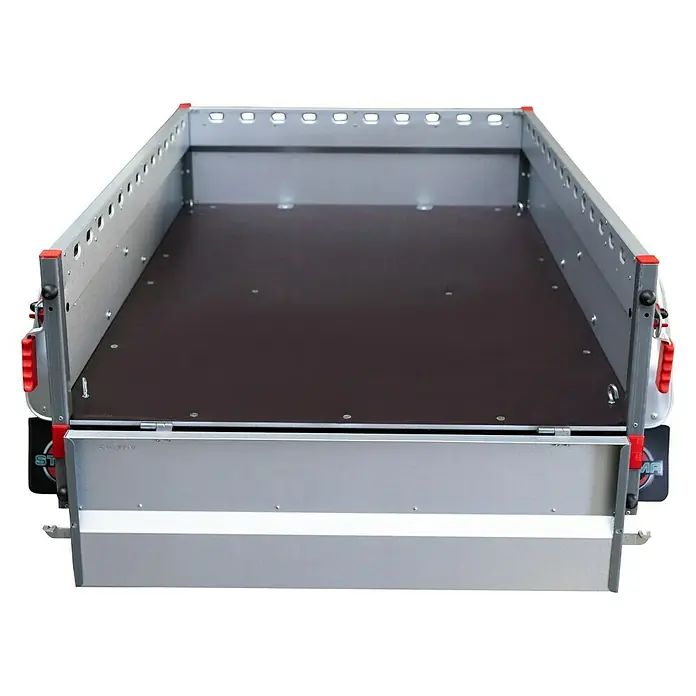 Stema Anhänger BH-R 850 - Nutzlast: 685 kg, Einachser, Kasteninnenmaß: 201 x 108 x 33 cm, Gebremst - Innenansicht eines Anhängers mit stabiler Ladefläche und robusten Seitenwänden für sicheren Transport.