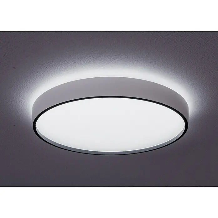 MegaLight LED-Deckenleuchte rund Wohlfühllicht Jupiter - 24 W, Ø x H: 38 x 10,3 cm, Weiß, Mehrfarbig - Nahaufnahme einer runden, modernen Deckenleuchte mit weissem Lampenschirm und schwarzem Rand, die helles Licht in den Raum wirft.