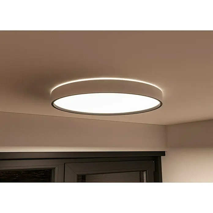 MegaLight LED-Deckenleuchte rund Wohlfühllicht Jupiter - 24 W, Ø x H: 38 x 10,3 cm, Weiß, Mehrfarbig - Diese Nahaufnahme zeigt eine moderne, runde Deckenleuchte mit weichem Licht, die einen Raum elegant beleuchtet und eine angenehme Atmosphäre schafft.