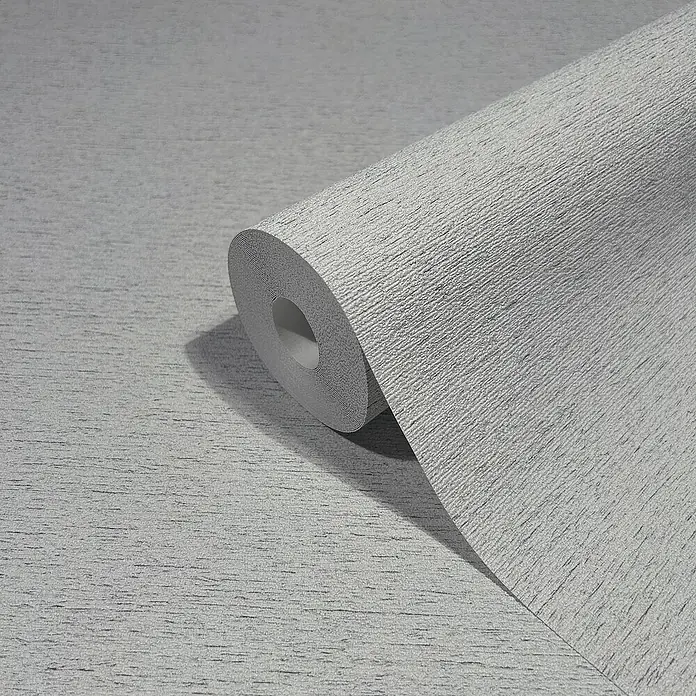Marburg Travertino Vliestapete Struktur - Grau, Steinoptik, 10,05 x 0,53 m - Nahaufnahme einer Rolle grauer Vliestapete mit feiner Struktur, ideal für moderne Wohnräume.