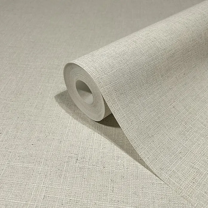 Marburg Travertino Vliestapete - Strukturbeige, Uni, 10,05 x 0,53 m - Nahaufnahme einer Rolle beiger Leinentapete, die ihre Textur und Farbe für die Wanddekoration zeigt.