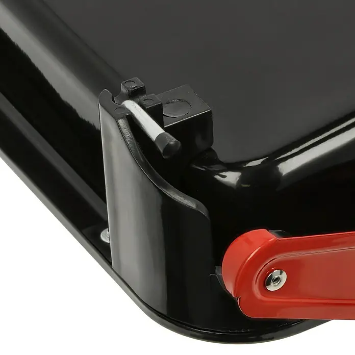 Lehnartz Kleistergerät Kleisterblitz Expert - Geeignet für: Euro Rollen 53 cm - Detailansicht einer schwarzen Briefkastenkomponente mit rotem Griff und silberfarbenem Metallstift.