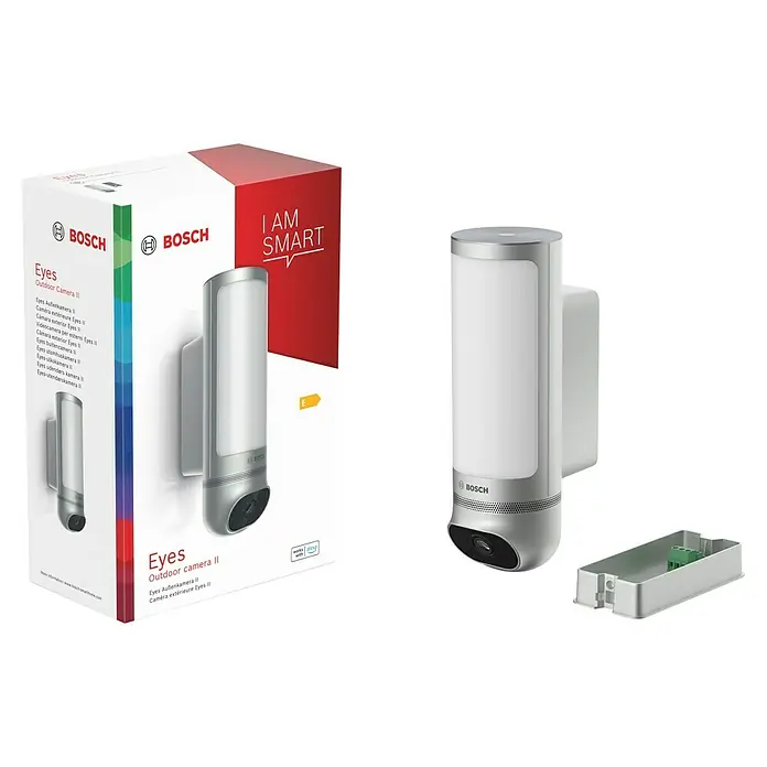 Bosch Smart Home Außenkamera Eyes II - 1.080 Pixel (Full HD), Silber, Erfassungswinkel: 180 °, Erfassungsreichweite: 8 m - Produktbild der Bosch Eyes Outdoor Camera II, einer intelligenten Überwachungskamera mit Außenleuchte, inklusive Verpackung.