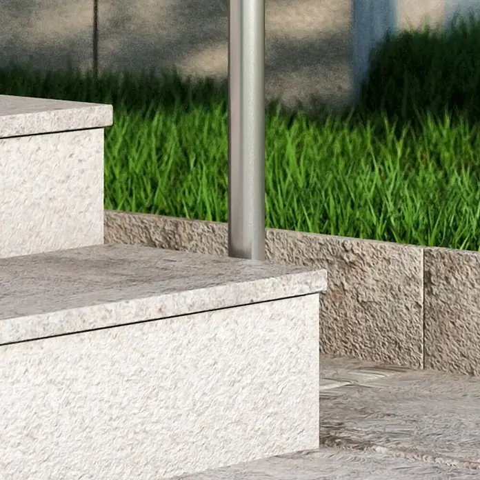 Dolle Geländer-Set PS 513 - Seitenmontage, Edelstahl V2A, Länge: 150 cm - Nahaufnahme von Granitstufen mit Metallgeländer und üppigem Grün. Elegantes Design vereint mit natürlicher Umgebung.